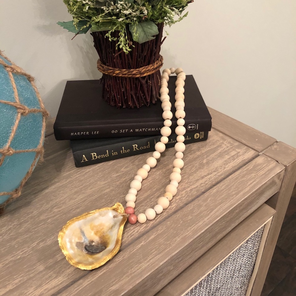 Handmade oyster shell and wood bead tassel